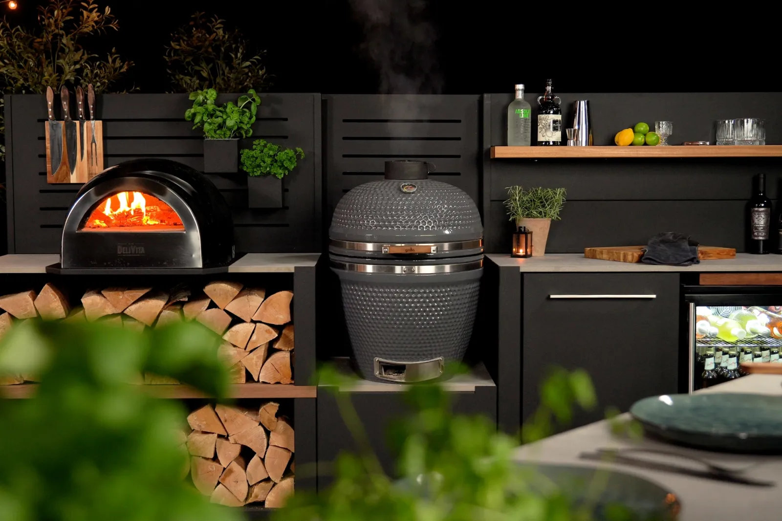 Bespoke outdoor kitchen layout fitted to the shape of the garden