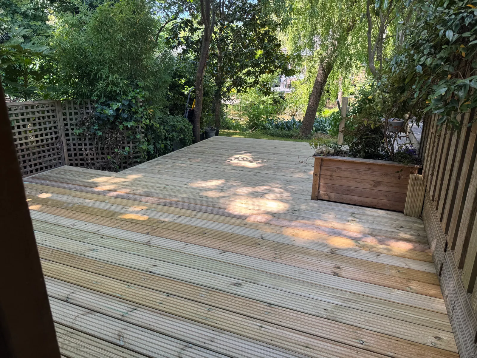 Responsibly sourced timber decking laid over a prepared sub-frame